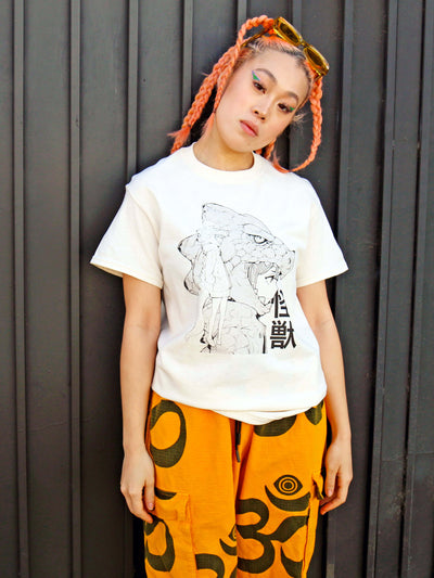 Beige kaiju anime girl graphic tee by Japanese artist Acky Bright.
