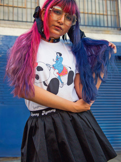 Model wearing an alien panda girl t-shirt.