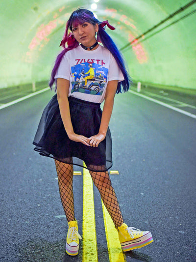 Model wearing a retro anime t-shirt.