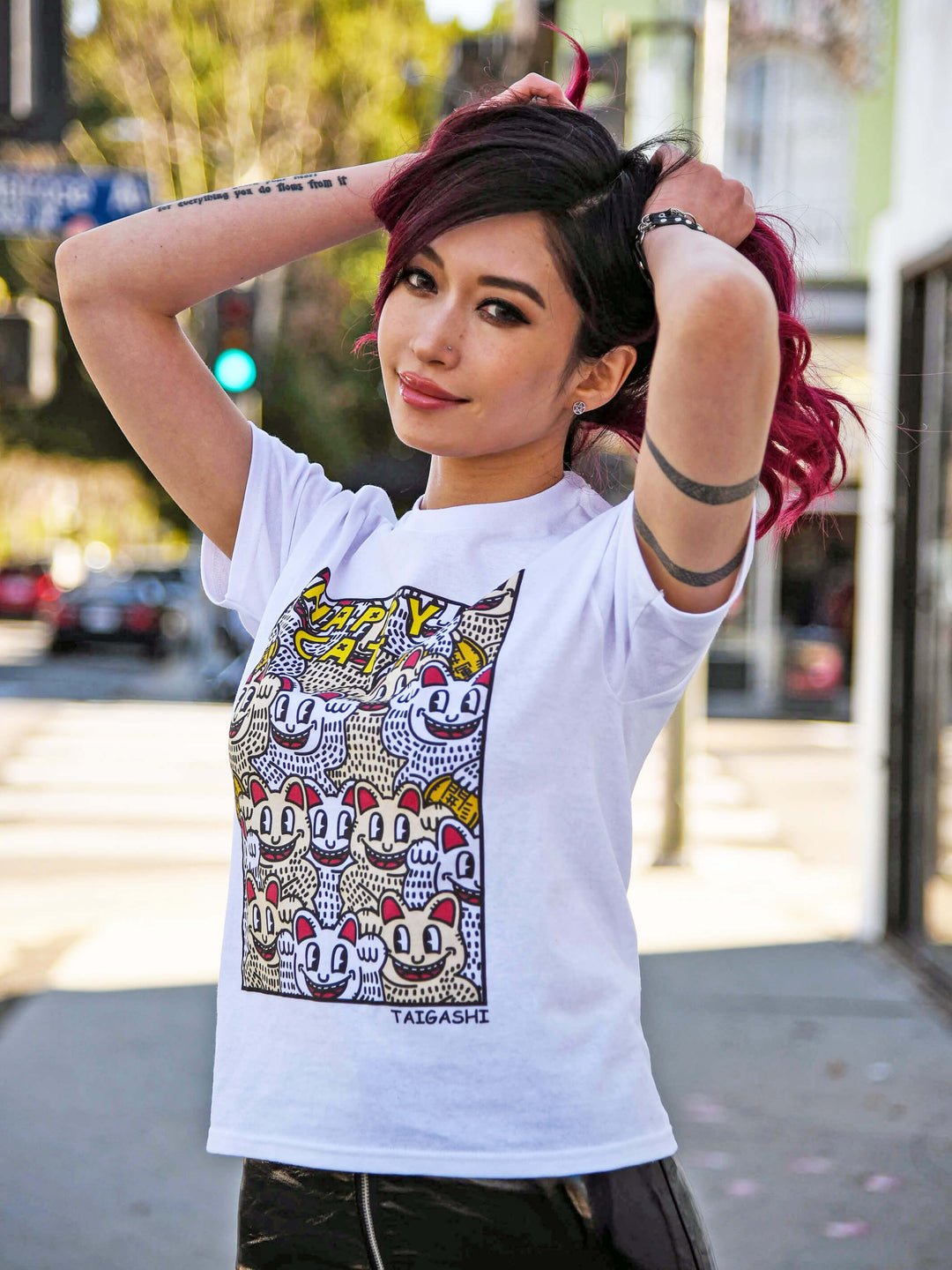 Model wearing a kawaii cat t-shirt.