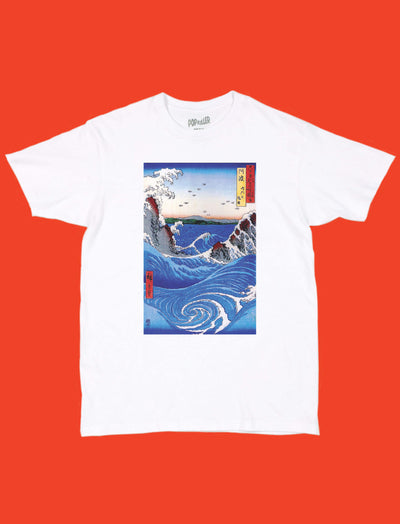 Graphic white t-shirt with an ukiyoe wave print on it.