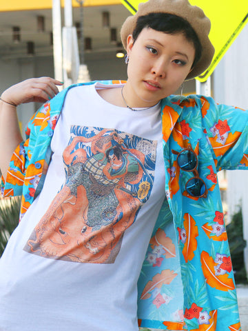 A white t-shirt with a samurai fighting an octopus on it.