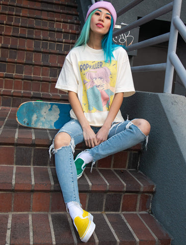 Model wearing Japanese vintage manga inspired anime babe graphic apparel.