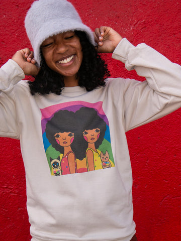 Model wearing gay pride we love rainbow sweatshirt designed by sunae artist Naoshi.