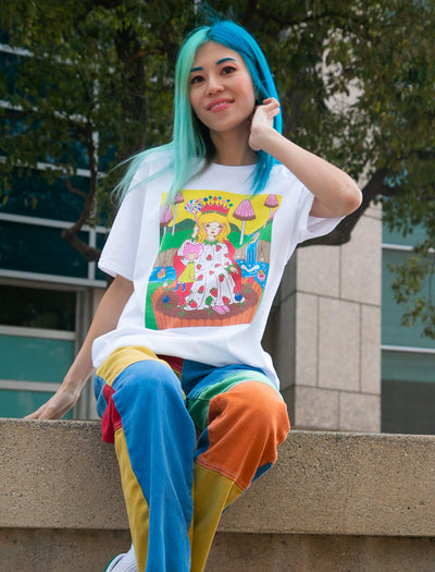 Model wearing the empress tarot card graphic tee designed by Japanese sunae colored sand pop artist Naoshi.