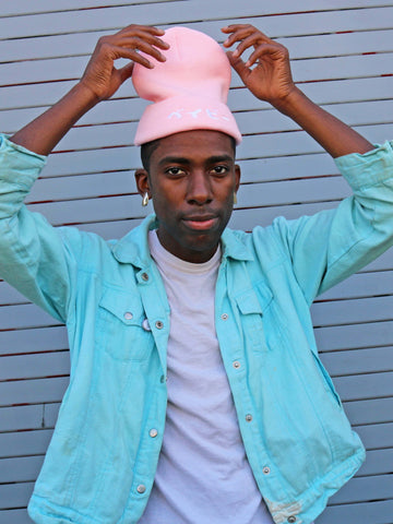 Kawaii pink beanie that says 'Baby' in Japanese.