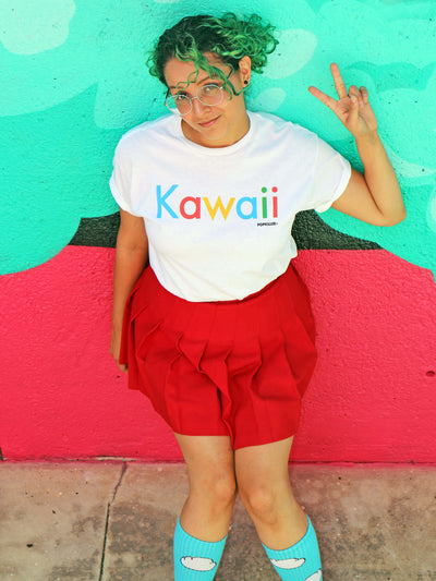 A model wearing a white tee that says kawaii parodying the Google logo.