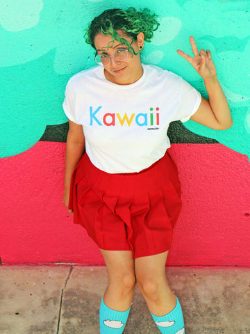 A model wearing a white tee that says kawaii parodying the Google logo.