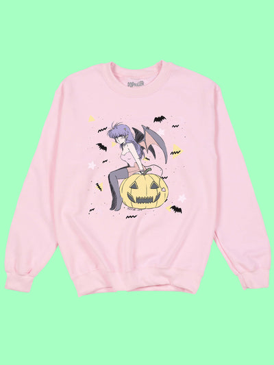 Pastel pink kawaii Halloween sweater.