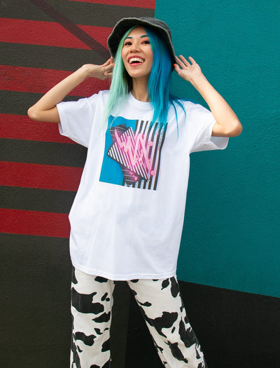 Model wearing vaporwave memphis style patterned apparel.