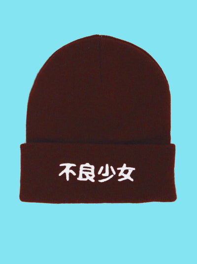 Blood red beanie with the words 'Bad Girl' embroidered in Japanese on it.