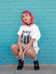 White graphic tee with a Black Flag parody by Little Tokyo brand Popkiller.