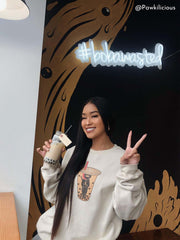 Model wearing a kawaii oversized boba sweater.