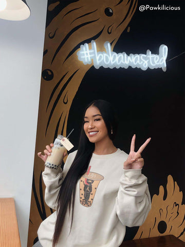 Model wearing a kawaii oversized boba sweater.