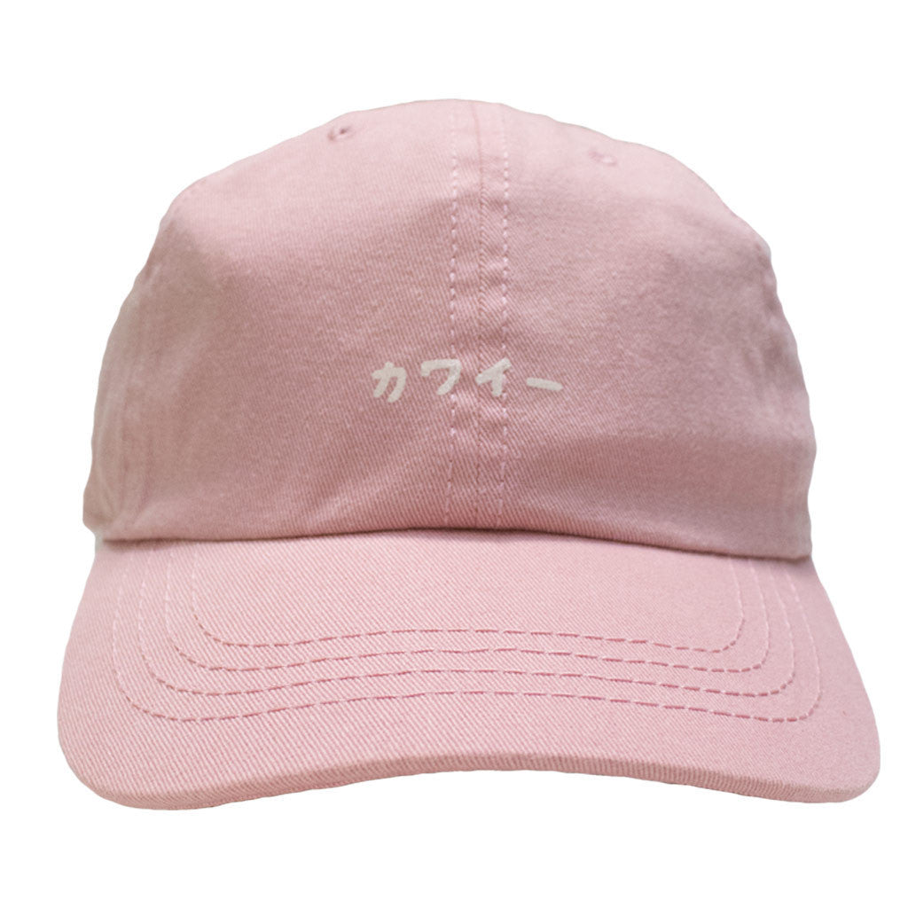 A pink polo cap that reads kawaii meaning cute in Japanese.