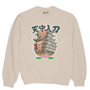 Beige sweater with a Japanese edo period castle on it.