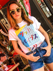Memphis style Japanese t-shirt that says 'Good Vibes Only'.