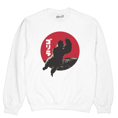 White sweater with King Kong over Hollywood on it.