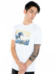 A model wearing a Japanese ukiyoe great wave print t-shirt.