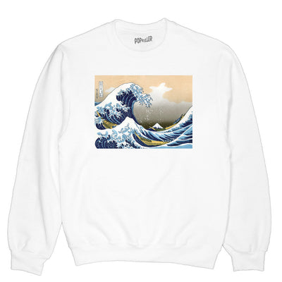A white sweater with The Great Wave print on it.