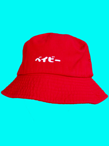 Red Japanese bucket hat with kanji slang that translates to baby.