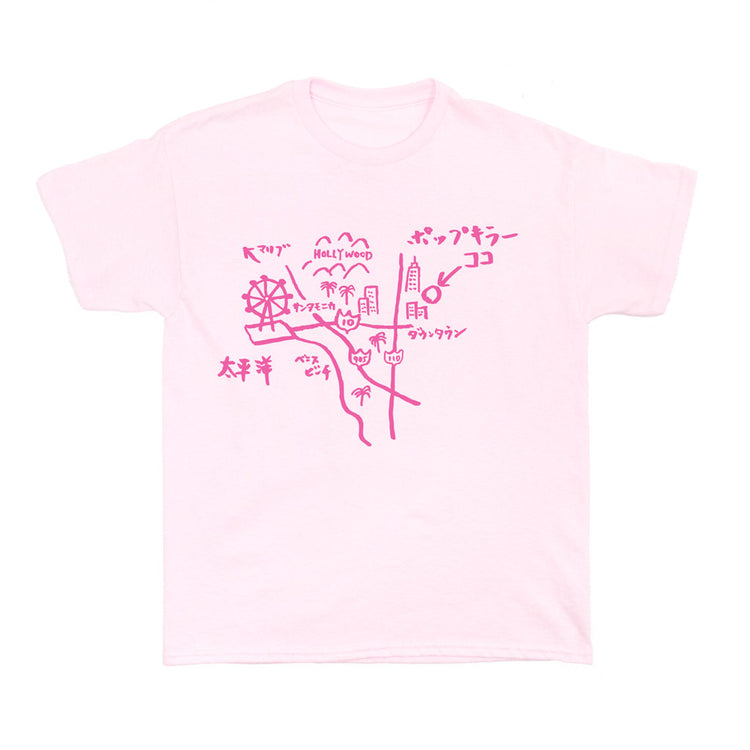 A pink t-shirt with a doodle of Los Angeles on it.