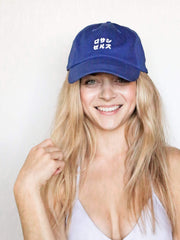 A blue dad cap that reads 'Los Angeles' in katakana.