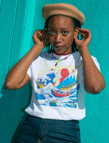 Model wearing cute Japanese Hokusai wave graphic tee designed by sunae artist Naoshi.