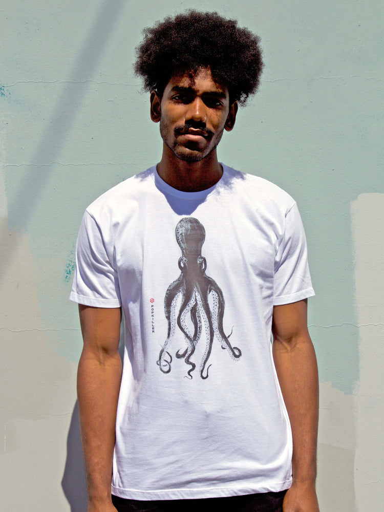 Model wearing an illustrated octopus t-shirt.