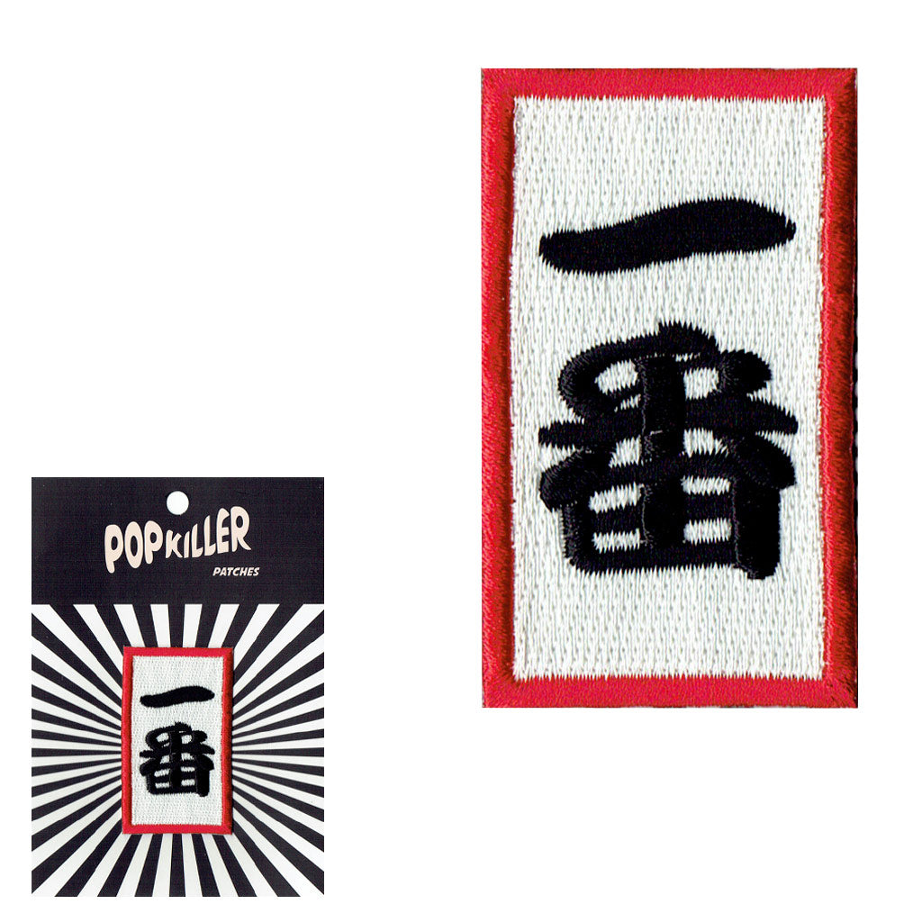 Red, white, and black rectangle patch that reads 'Number 1' in Japanese.