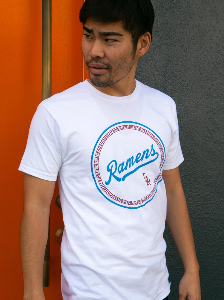 Person modelling a Popkiller original design inspired by baseball white graphic t-shirt.