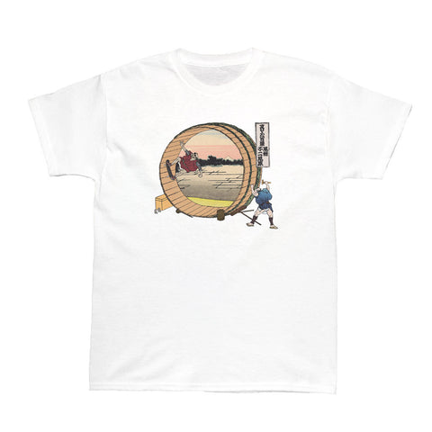 Skateboarding in a sake barrel graphic t-shirt.