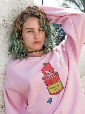 Pink soft sweater with a kawaii strawberry on it.