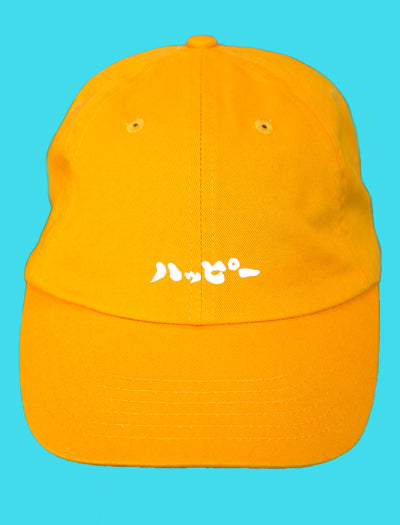 Japanese dad cap with katakana characters that translates to happy.